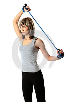 Sportswoman with resistance band