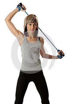 Sportswoman with resistance band