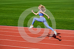 Sportswoman in sportswear jumping. Woman running during. Sport backgrounds. Runner. Professional sportswoman during