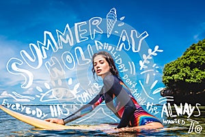 sportswoman in wetsuit on surfing board in ocean at Nusa dua Beach Bali Indonesia