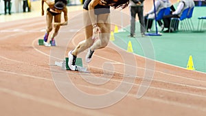 Sportswomen starting running sprint