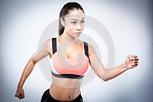 Sporty Asian Girl Running Pose