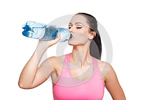 Sporty brunette woman drink water photo