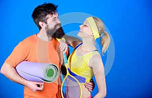 Sporty couple. Healthy lifestyle concept. Man and woman couple in love with yoga mat and sport equipment. Fitness