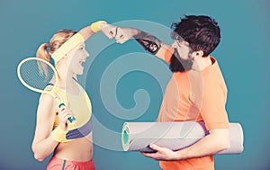 Sporty couple. Healthy lifestyle concept. Man and woman couple in love with yoga mat and sport equipment. Fitness
