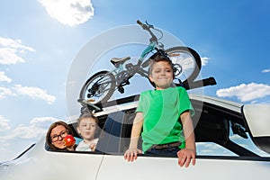 Sporty family travelling by car in summer