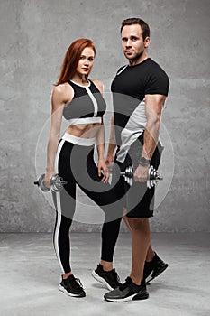 Sporty fitness couple. Beautiful athletic man and woman together