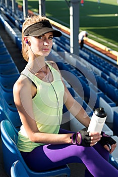 Sporty girl on the stadium