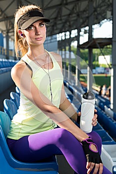 Sporty girl on the stadium