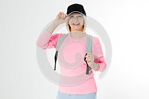 Sporty happy middle age beautiful woman with backpack isolated on white background. Copy space. Mid aged women healthy lifestyle.