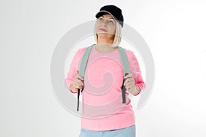 Sporty happy middle age beautiful woman with backpack isolated on white background. Copy space. Mid aged women healthy lifestyle.