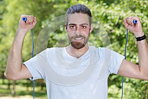 sporty man with jumping rope