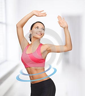 Sporty woman in aerobic or dance movement