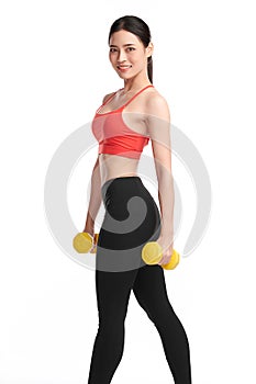 Sporty woman does the exercises with dumbbells on white background, Strength and motivation