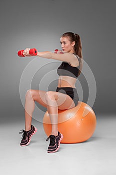 Sporty woman doing aerobic exercise