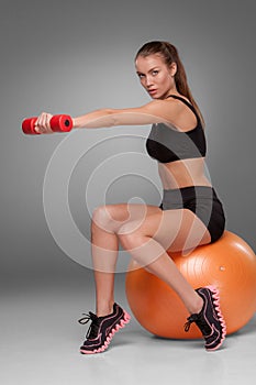 Sporty woman doing aerobic exercise