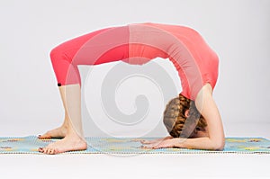 Sporty woman doing stretching exercise