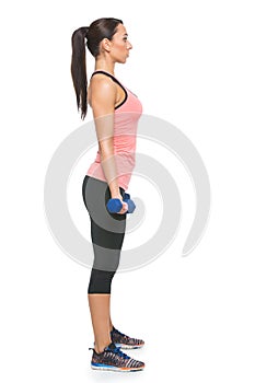 Sporty woman with dumbbells