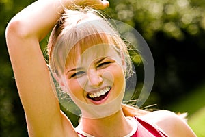 Sporty woman with happy smile