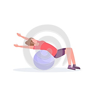 Sporty woman lying fitness ball girl doing exercises training in gym aerobic pilates workout healthy lifestyle concept