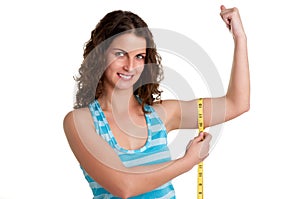 Sporty Woman Measuring Her Biceps