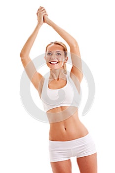 Sporty woman over white rising up hands