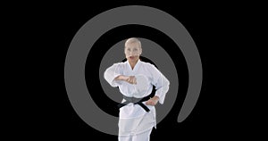 Sporty woman practising karate