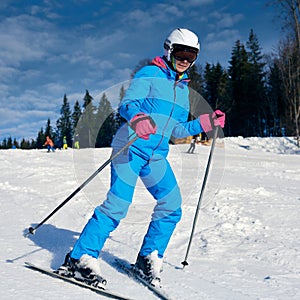 Sporty woman skiing
