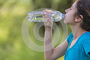 Sporty woman thirsty after sports