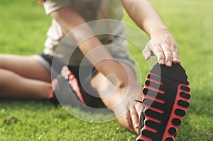 Sporty woman warm up at a outdoors