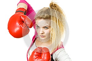 Woman wearing boxing gloves