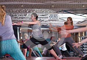 Sporty women doing aerobics exercises