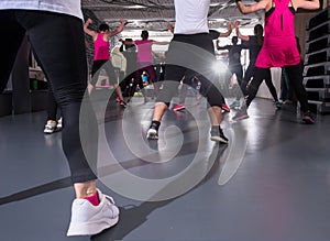 Sporty women doing aerobics exercises