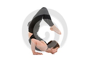 Sporty young man doing backbend