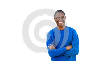 Sporty young man smiling on isolated white background