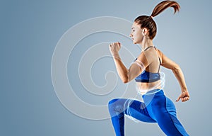 Sporty young woman runing and jumping. Sport concept.