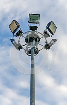 Spot light tower in blue sky