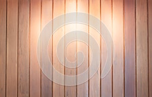 Spot light on wooden wall background