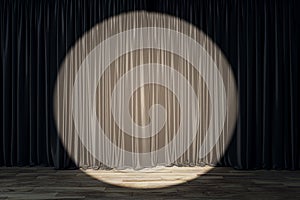Spotlight on taupe curtains against a dark backdrop, theatrical stage setting.