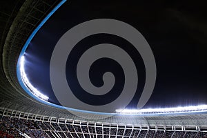 Spotlights and floodlights at a stadium at night