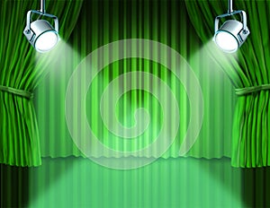 Spotlights on green velvet cinema curtains