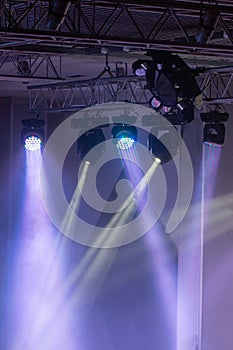 Spotlights and laser beams. Concert light.