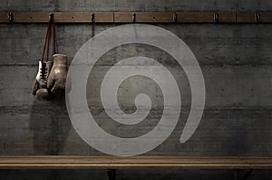 Worn Vintage Boxing Gloves Hanging In Change Room