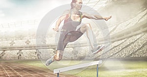 Spots of light against caucasian female athlete jumping over hurdles against sports stadium