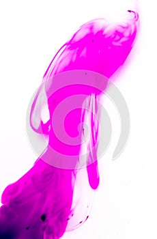 Spots of red potassium permanganate on a white background