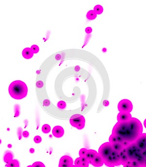 Spots of red potassium permanganate on a white background