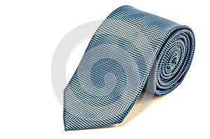 Spotted blue tie close up on white background