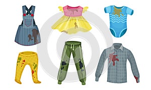 Spotted Kids Clothes with Splashes of Mud All Around Vector Set