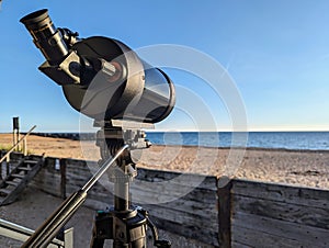 Spotting scope watching ships and birds