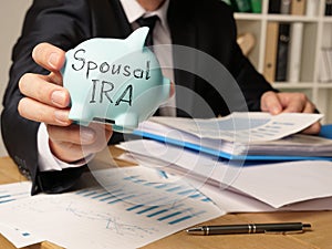 Spousal IRA is shown on the conceptual business photo photo